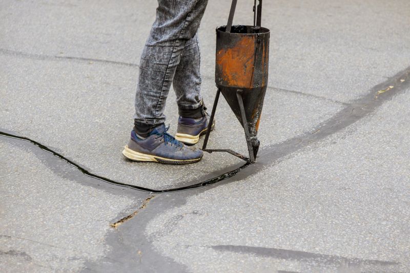 Crack Filling and Sealcoating